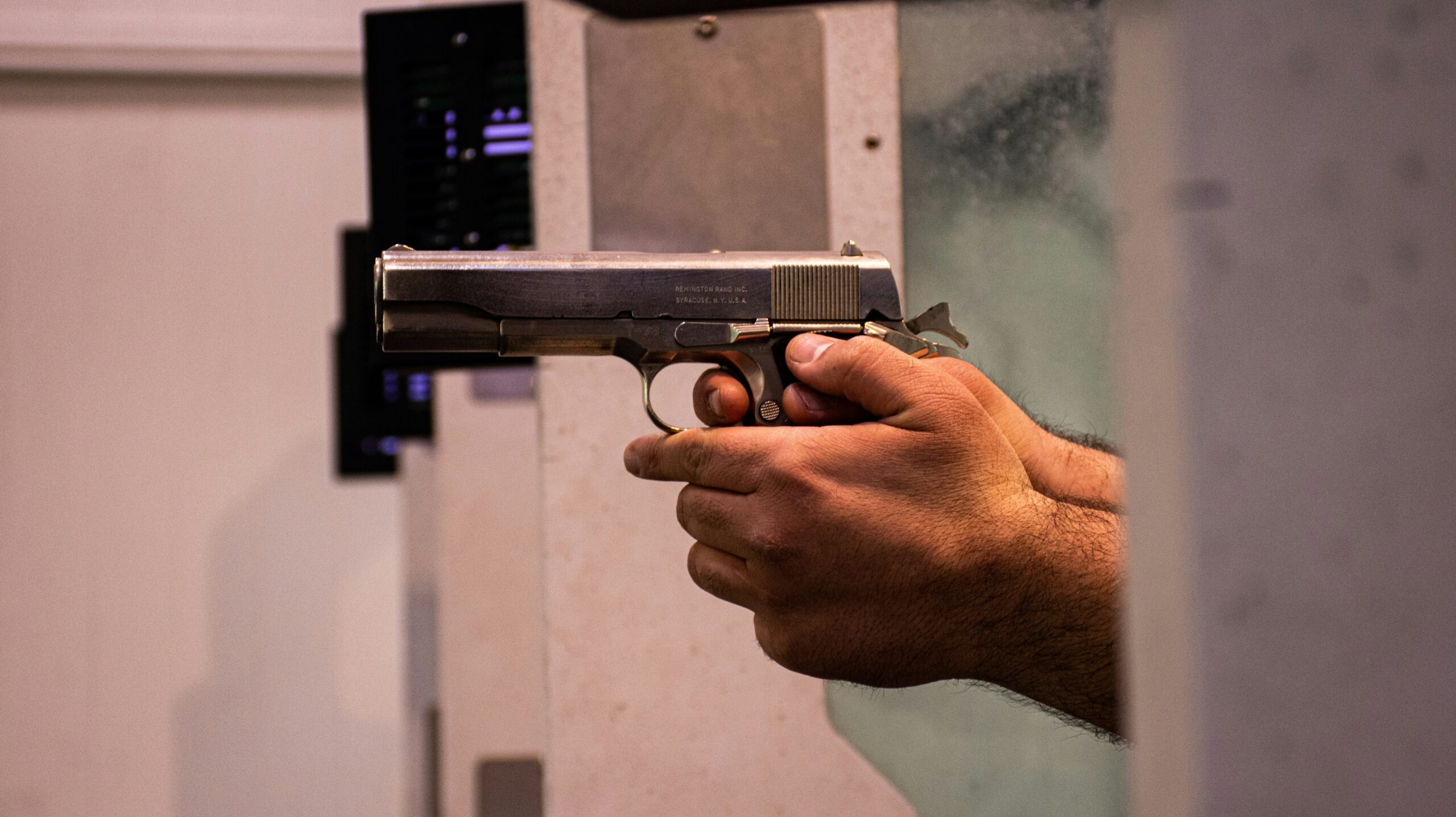 aiming gun down range
